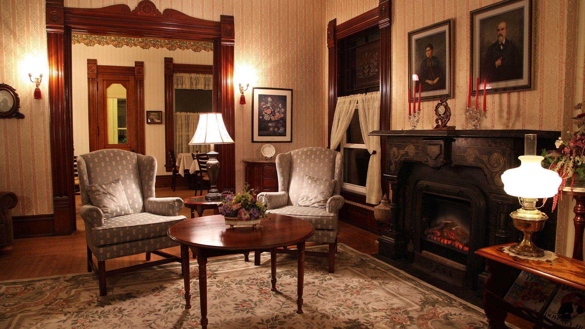 A living room filled with furniture and a fireplace