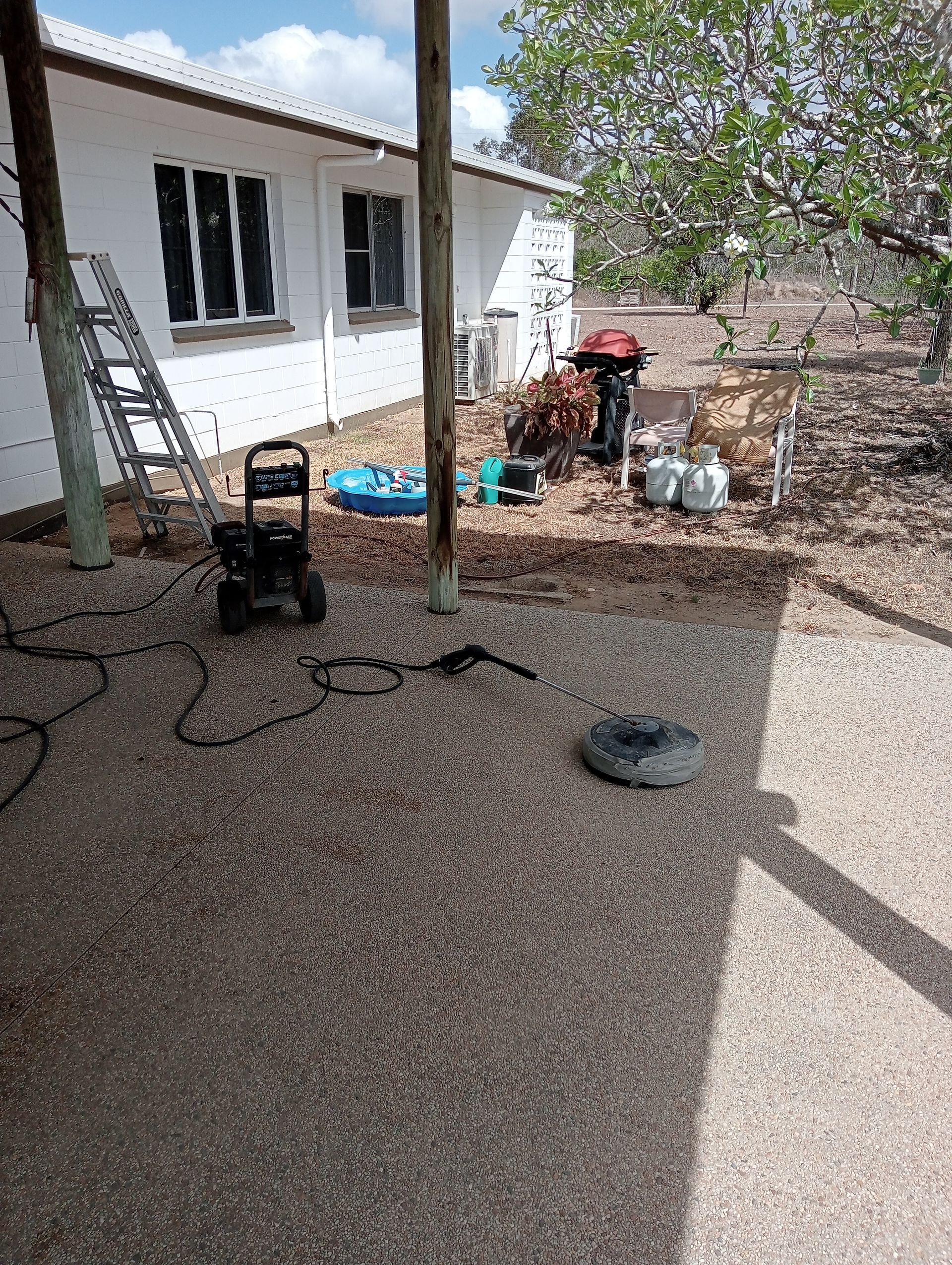 Gravel Patio With a Pressure Washer — All Sparkles Cleaning Technology In Bowen, QLD