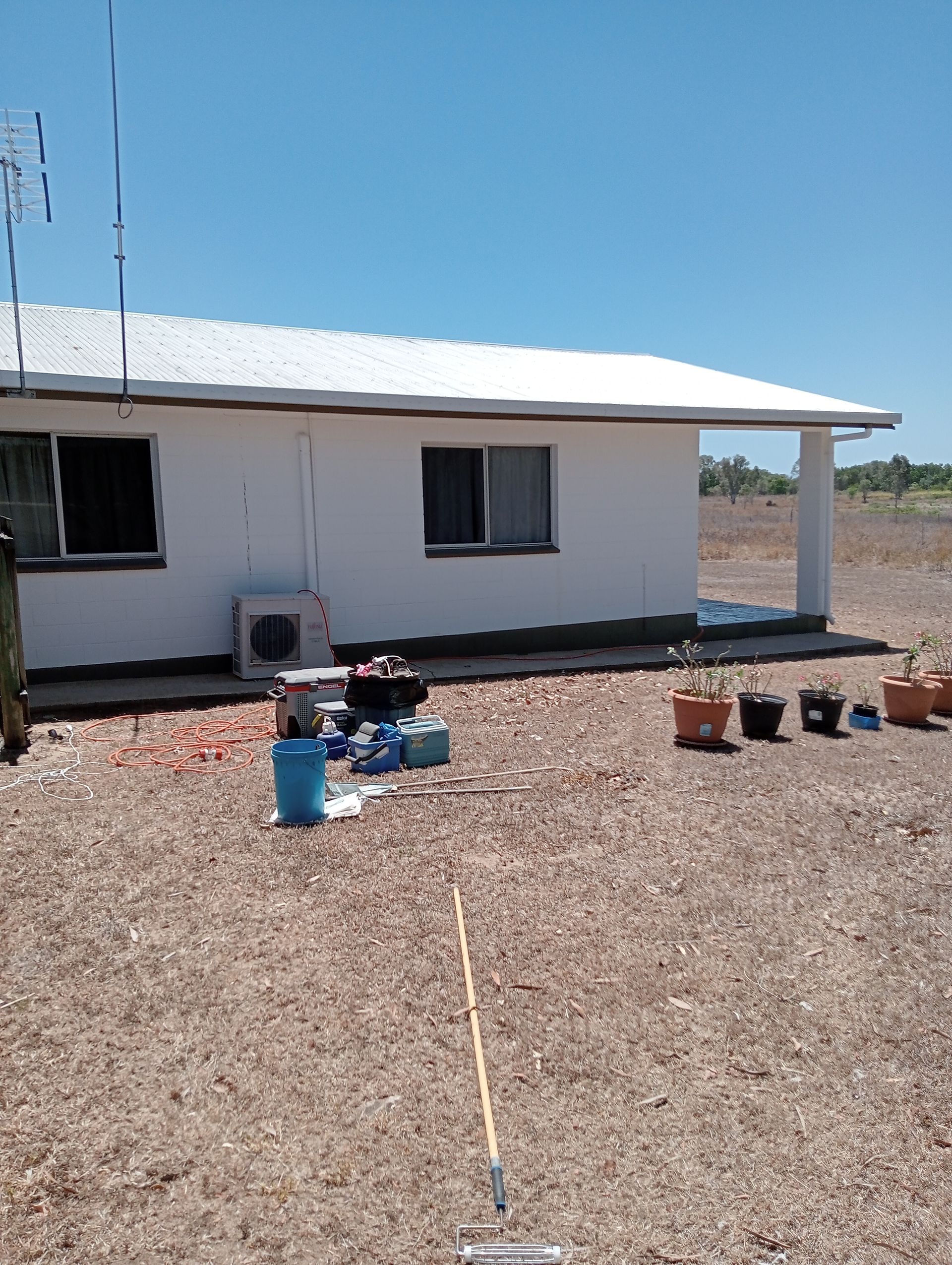 White House With a Metal Roof, Blue Sky — All Sparkles Cleaning Technology In Airlie Beach, QLD