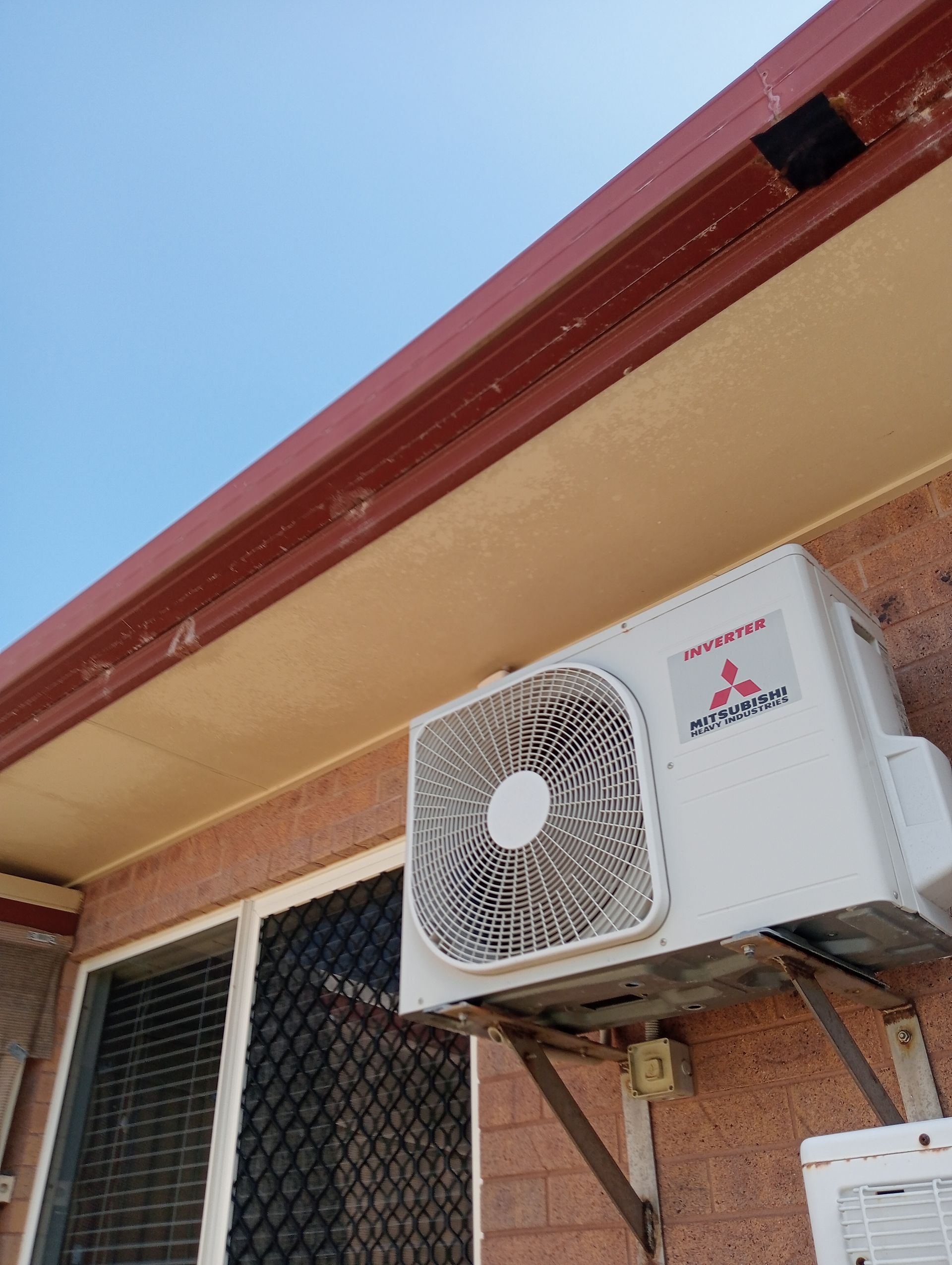 Exterior View of a Mitsubishi Air Conditioning Unit — All Sparkles Cleaning Technology In Bowen, QLD