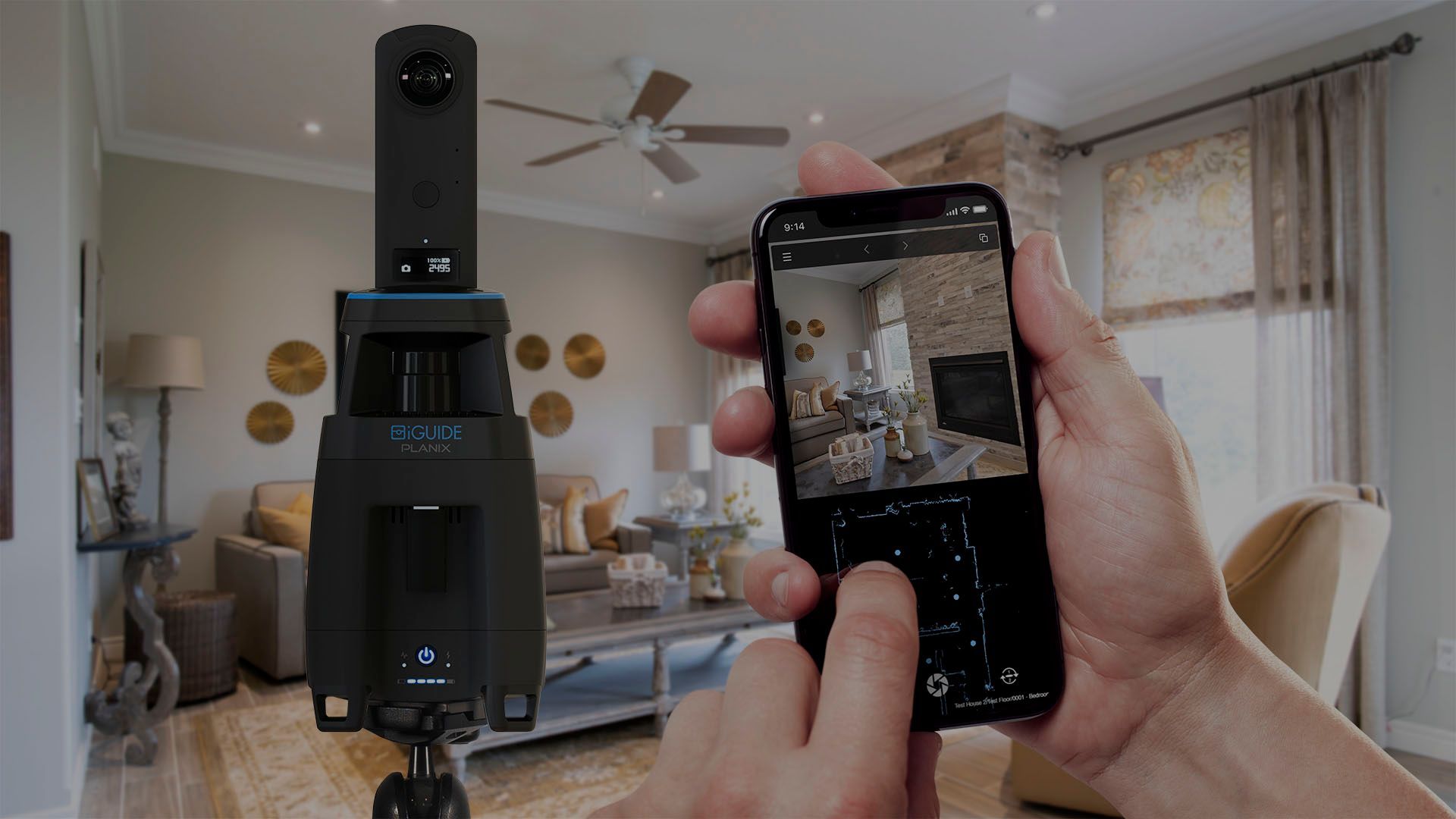 Hand holding a smartphone photographing a bright living room with a tall black camera or scanner on a tripod