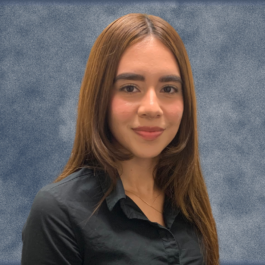 A woman with long brown hair is wearing a black shirt.