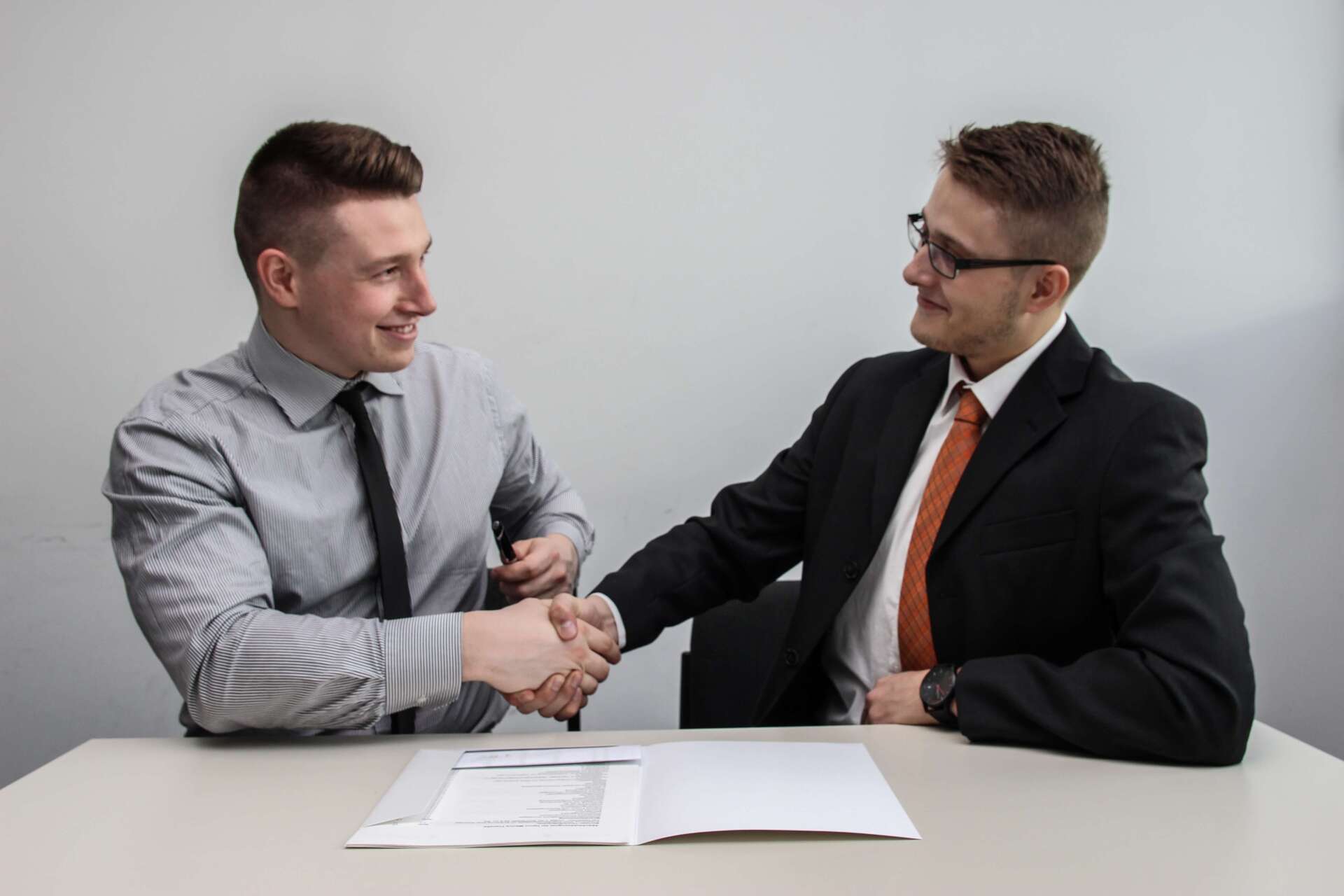 Business Agreement Two Men Shaking Hands