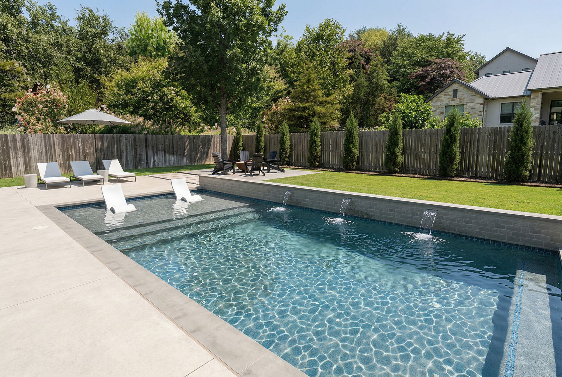 Custom pool by Clearform Pool Co., designed and built in Austin, TX.