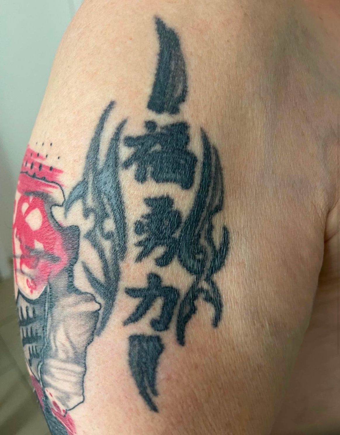 A close up of a tattoo on a person 's arm.