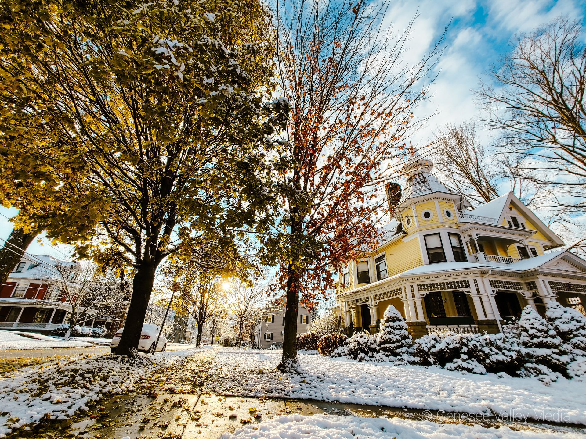 Yellow house in Allegany County, NY during the winter.