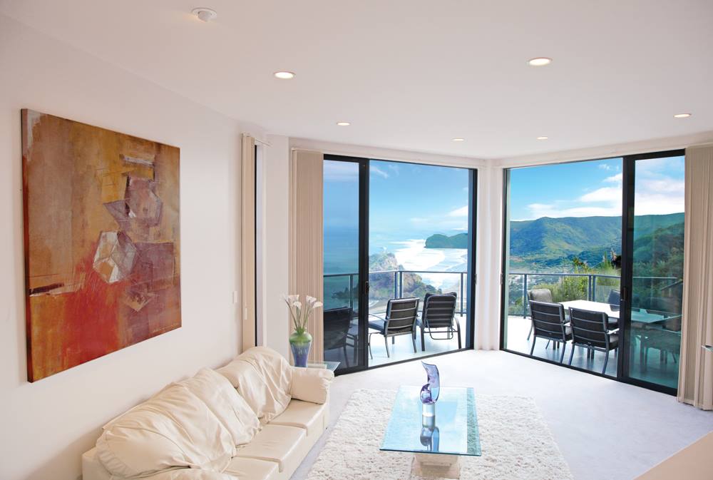 Airbnb living room photography to boost bookings, Piha Auckland.