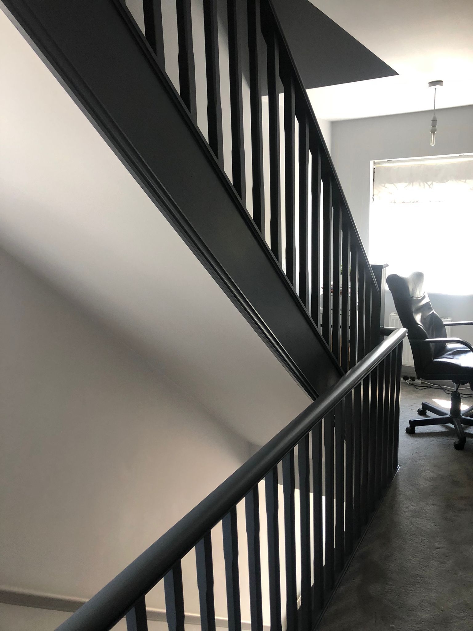A picture of  a landing painted white matt by Signature Painters and Decorators York