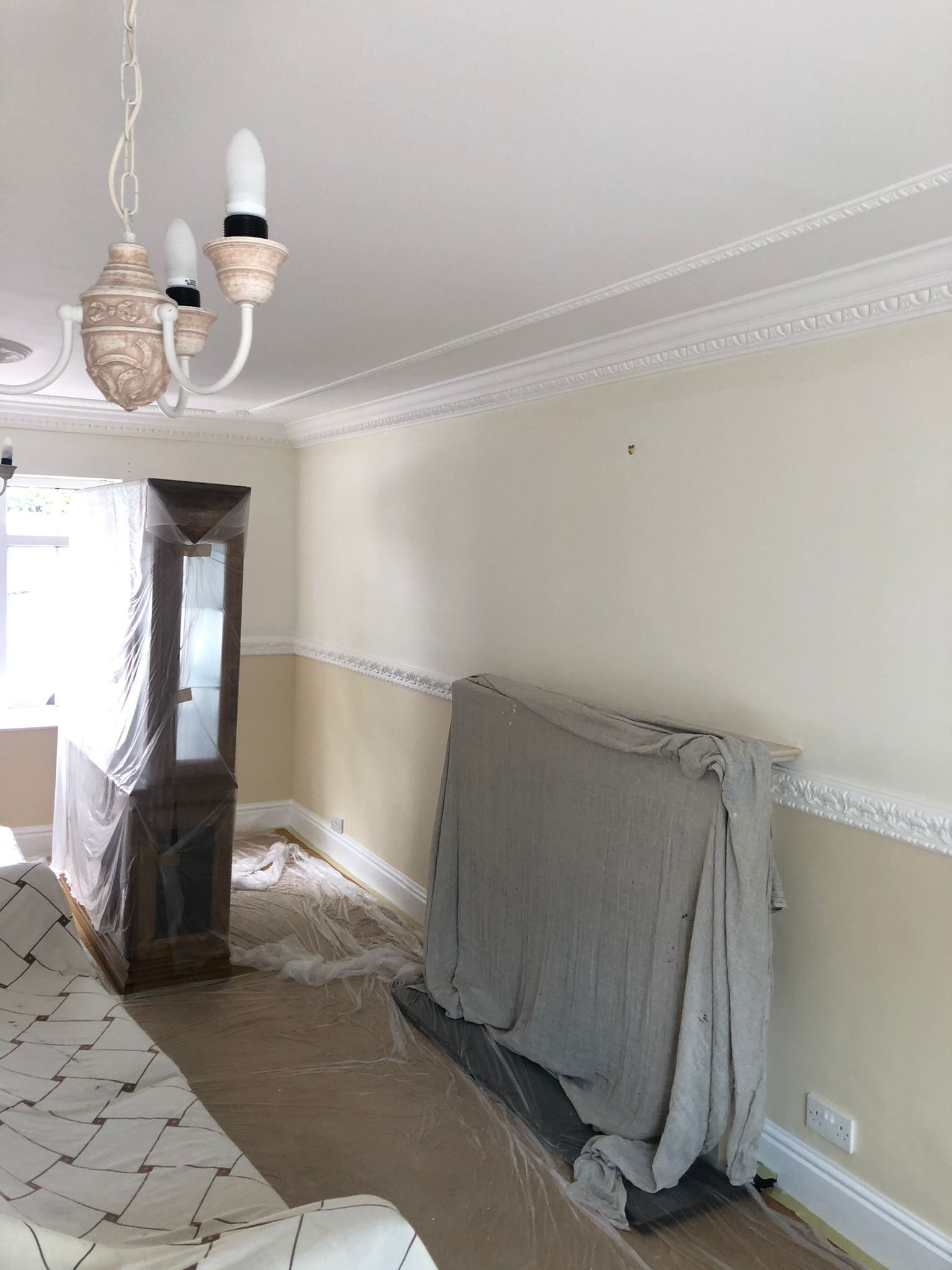 A picture of a living room painted white by Signature Painters and Decorators York