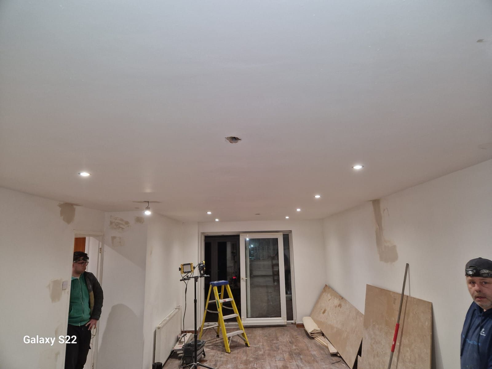 A picture if a kitchen diner painted white by Signature Painters and Decorators York