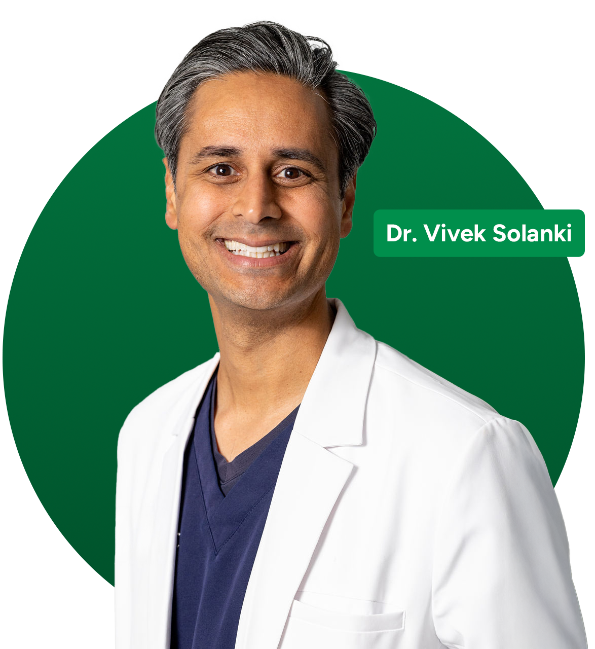 Dr. Vivek Solanki smiling, wearing a white coat, in front of a green background.