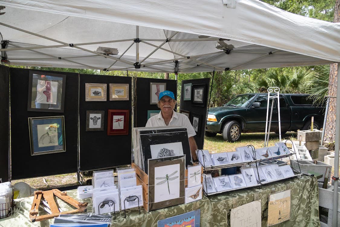Vendor selling art at event