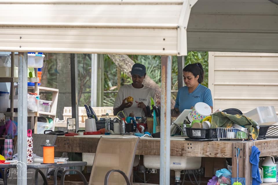 Volunteers helping with food prep