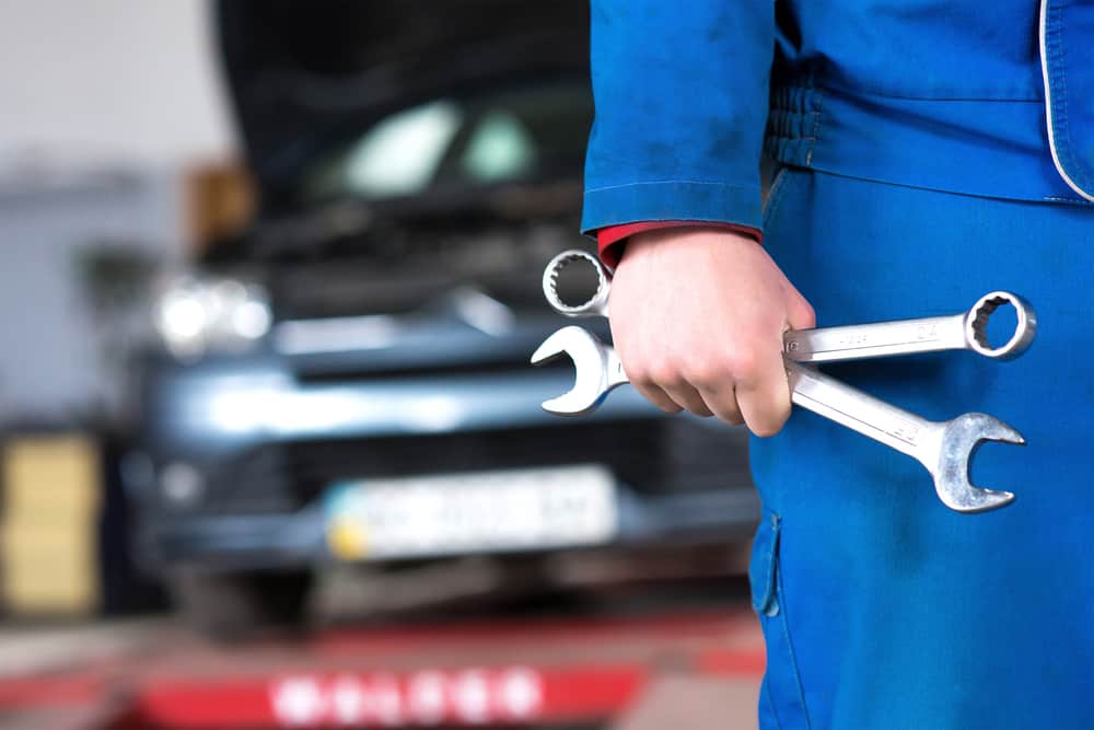 Mechanic Holding Wrench — Car Repairs in Maroochydore, QLD