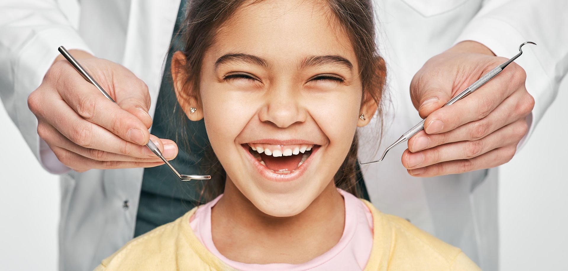 Cheerful child enjoying a relaxed dental visit with a bright, happy smile. Cheerful child enjoying a relaxed dental visit with a bright, happy smile.