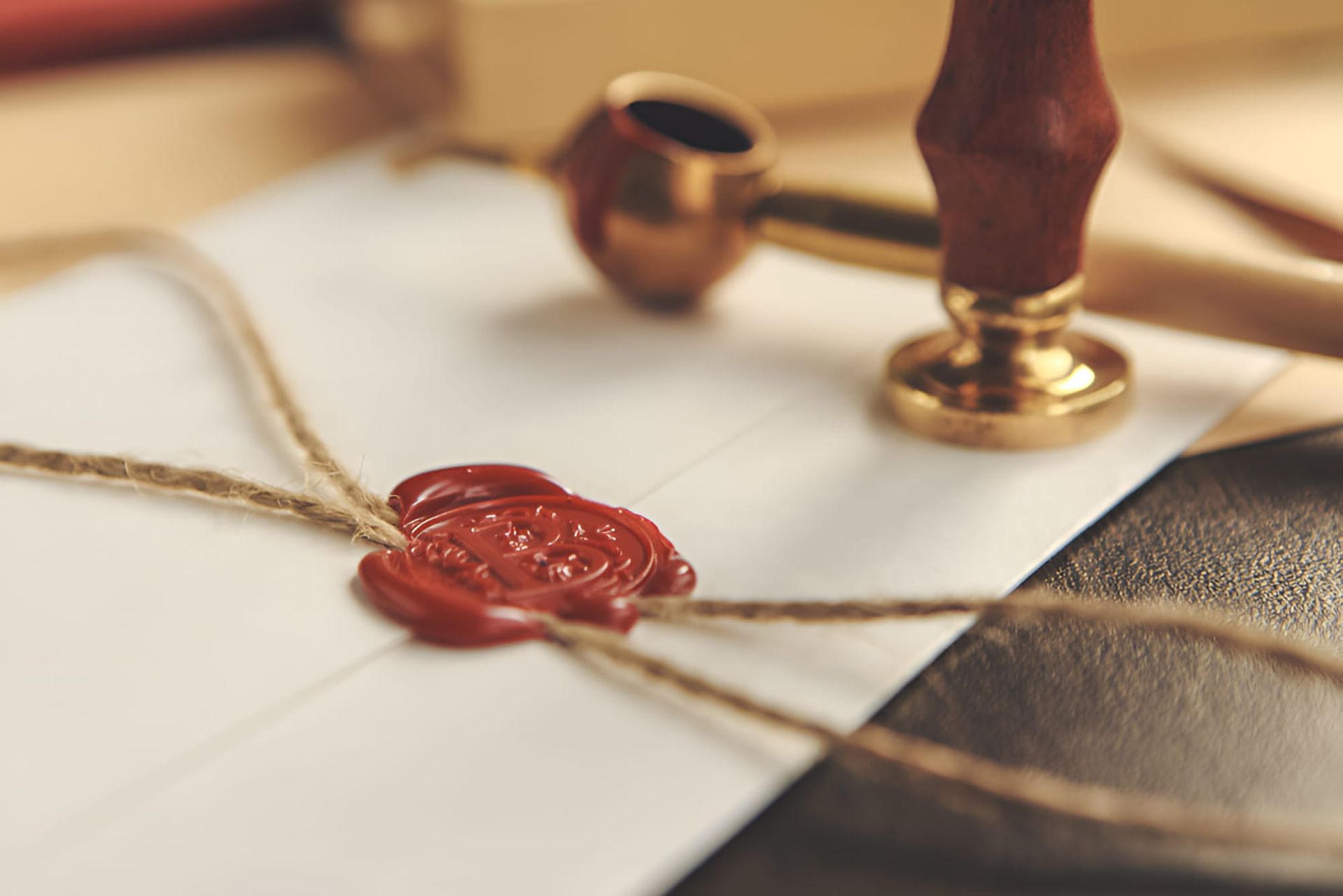 A Close Up Of A Letter With A Wax Seal On It — De Silva Hebron In Darwin City, NT