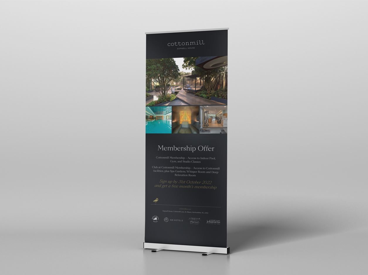 Roll-up banner displaying photos of a property and text in white on a black background.