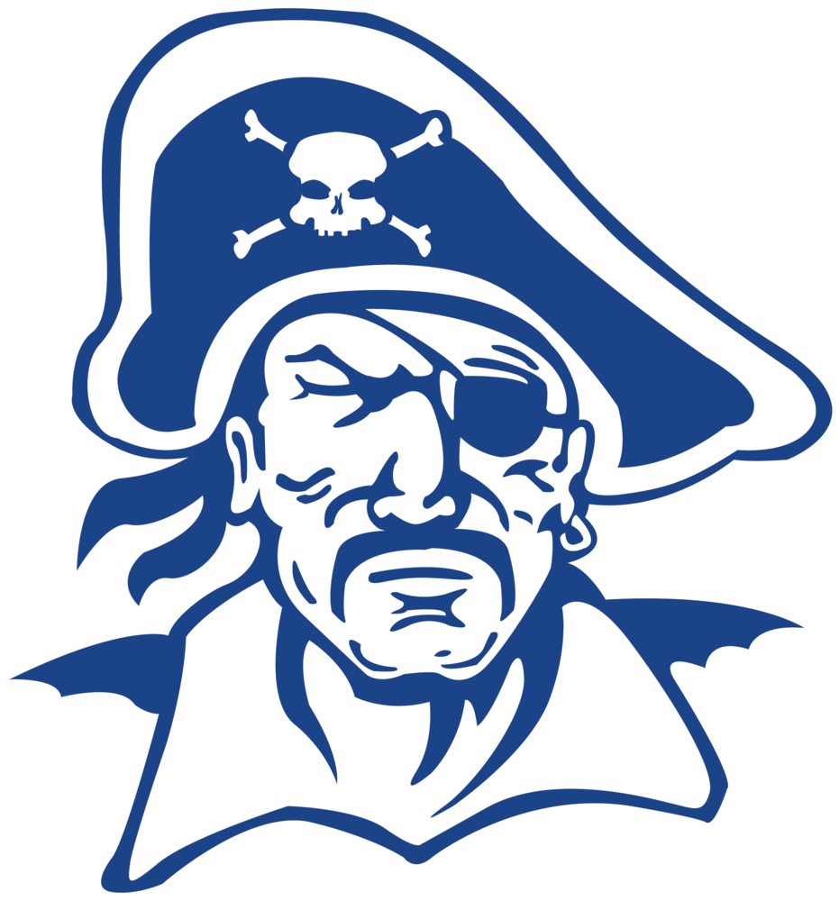 Man with crossed arms on a football field. He is wearing a blue polo shirt, khaki pants, and has a serious expression.