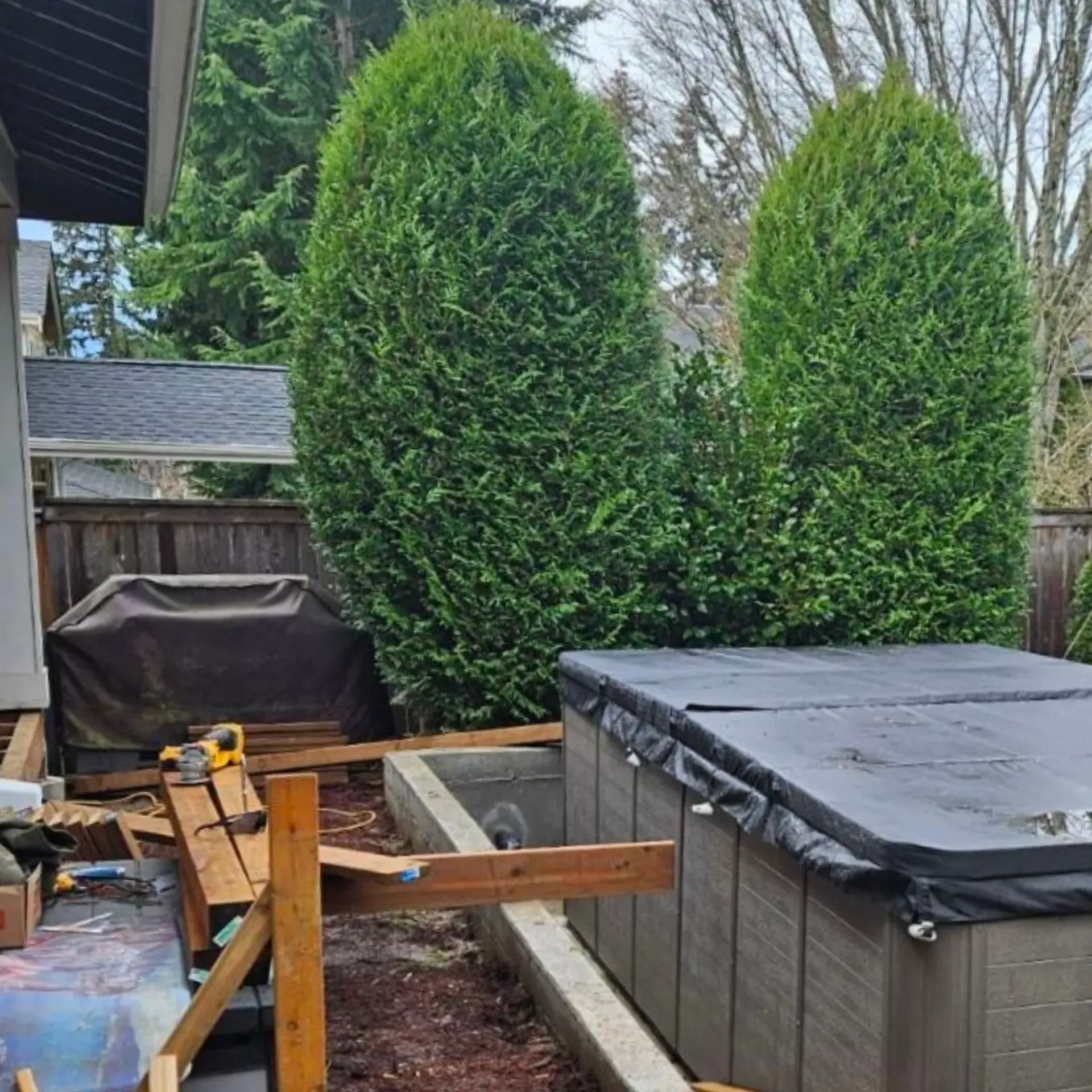 Israel Inc. - A hot tub is being built in the backyard of a house.