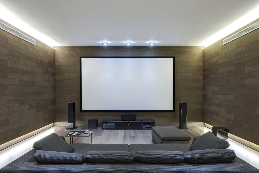 A Living Room With a Projector Screen and a Couch — A1 Antenna Doctor In Wauchope, NSW