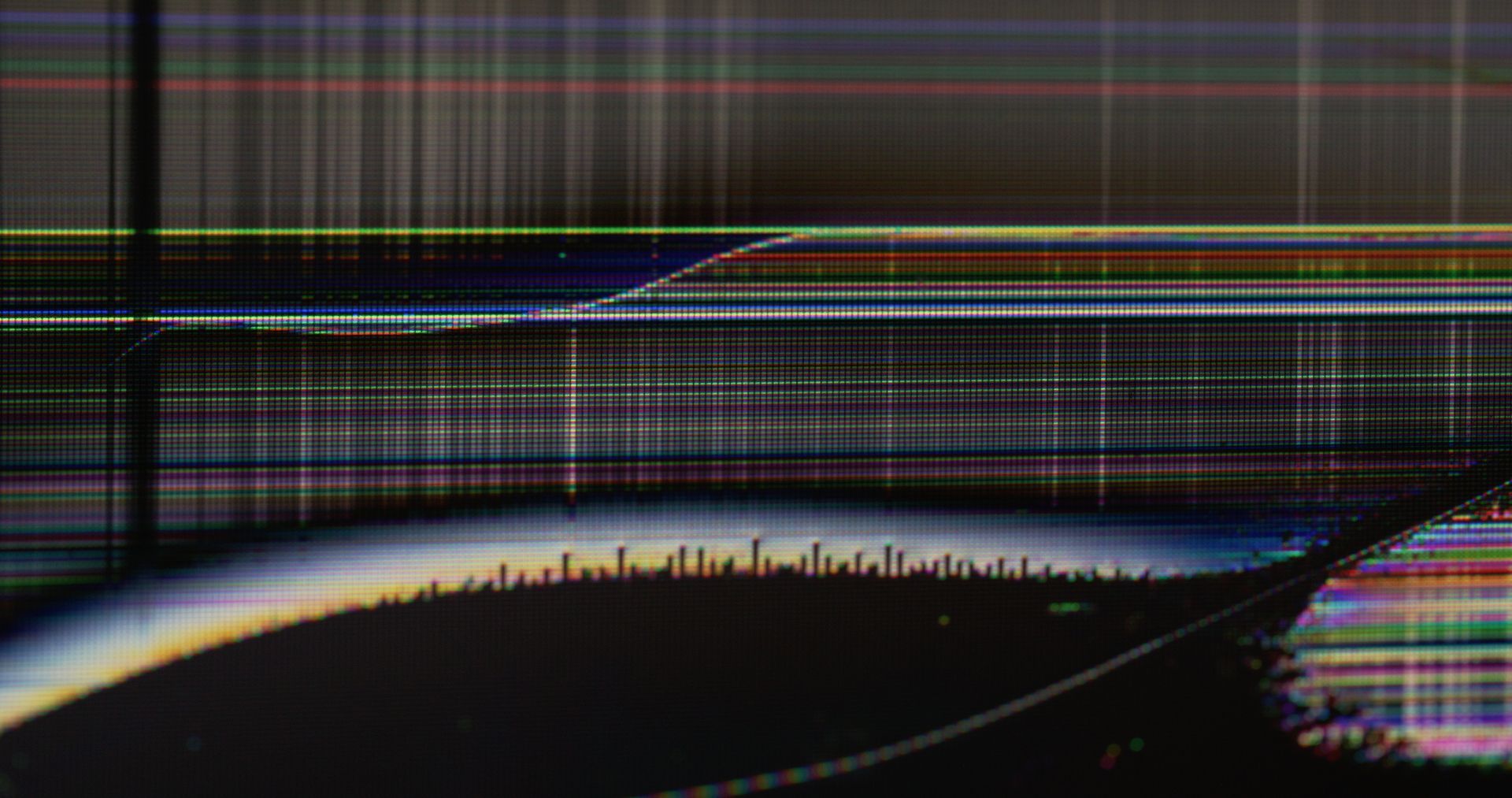 A Close up Of a Broken Computer Screen with A Rainbow of Colours  — A1 Antenna Doctor In Port Macquarie, NSW
