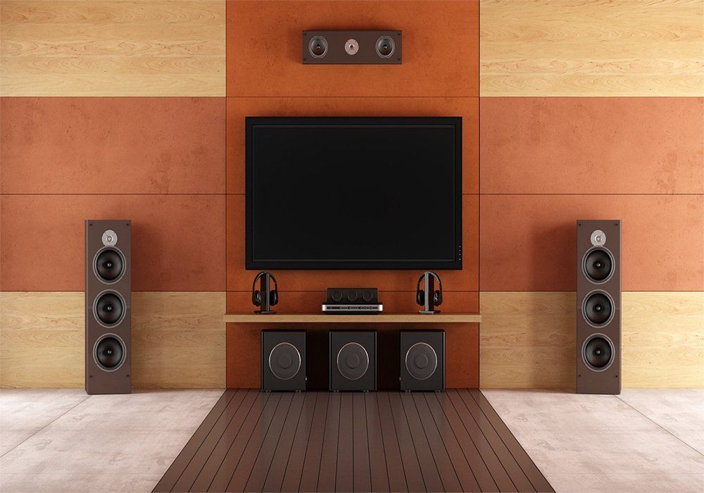 A Living Room With a Flat Screen TV and Speakers — A1 Antenna Doctor In Port Macquarie, NSW
