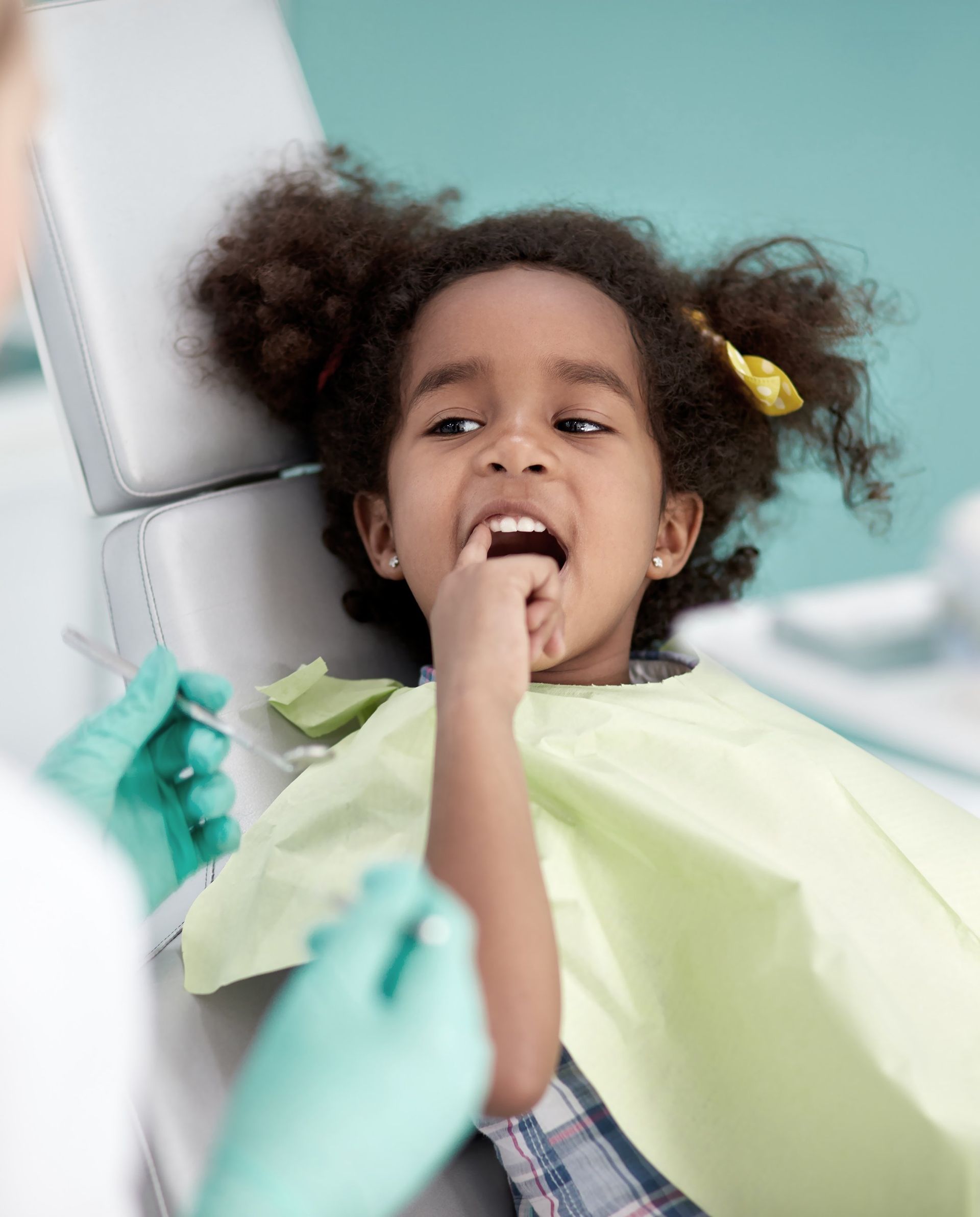 Little girl at the dentist