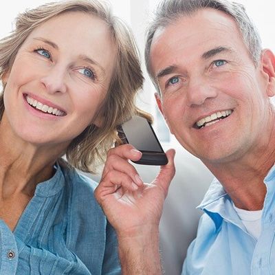 Couple calling for a appointment - Auditory services in Athens, AL