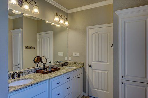 Clean Washroom With Mirror — Mooresville, NC — Bryan Clodfelter Construction Company