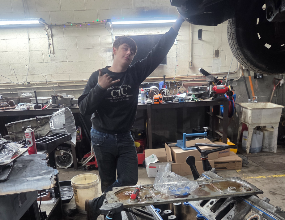 Person working in a car | Apex Transmission and Auto
