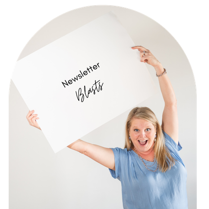 A woman is holding up a sign that says newsletter blasts.