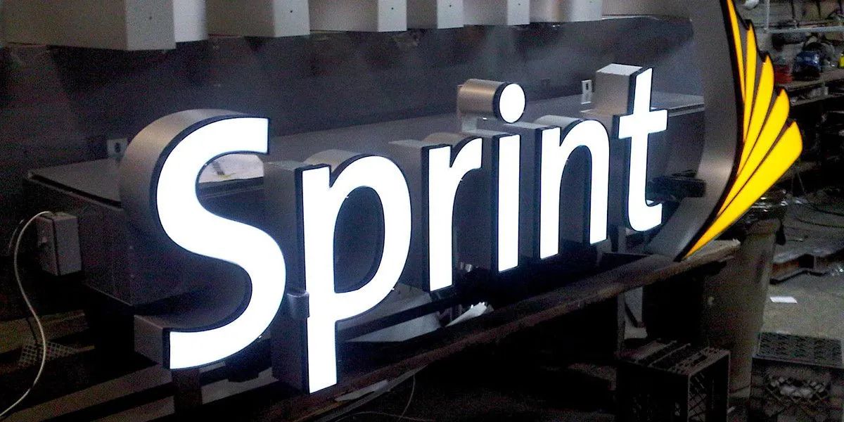 Illuminated channel letter sign on a storefront in Apex, NC by Carolina Signs & Wonders.