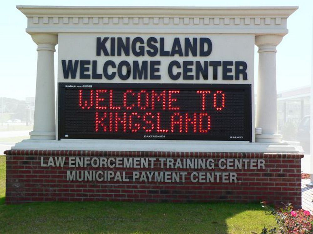 Programmable digital message center lighted sign in Apex, NC displaying vibrant colors and dynamic content for business promotion.