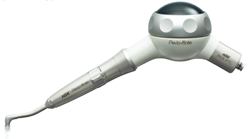 Dental air polisher with white and silver body.