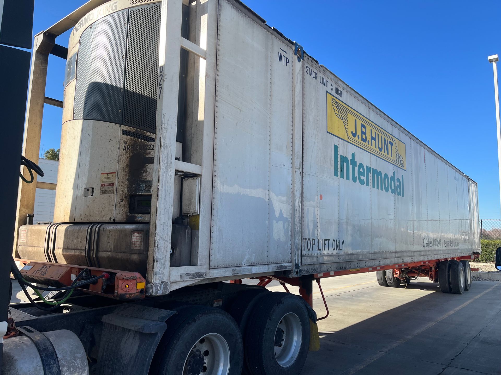 White refrigerated semi-trailer with 