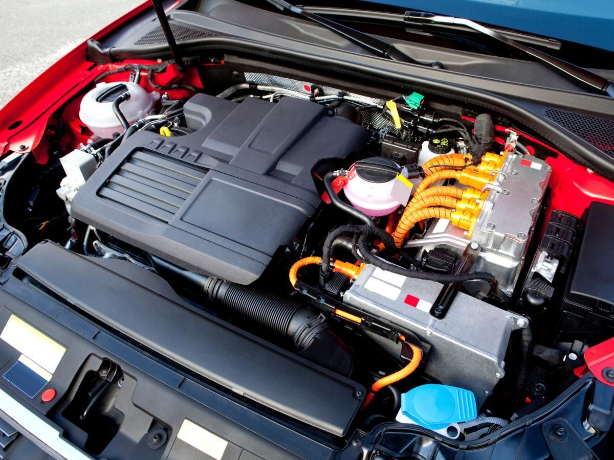 inspecting a hybrid car engine at our Reading workshop