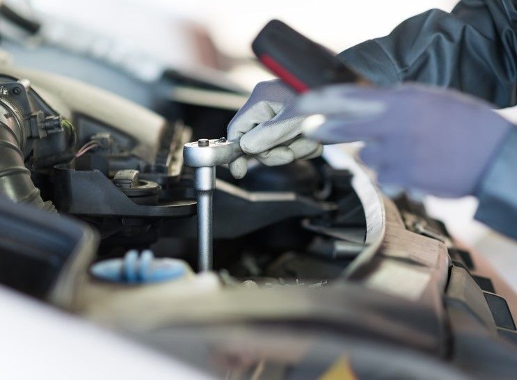 initial check of engine during an MOT test in Reading