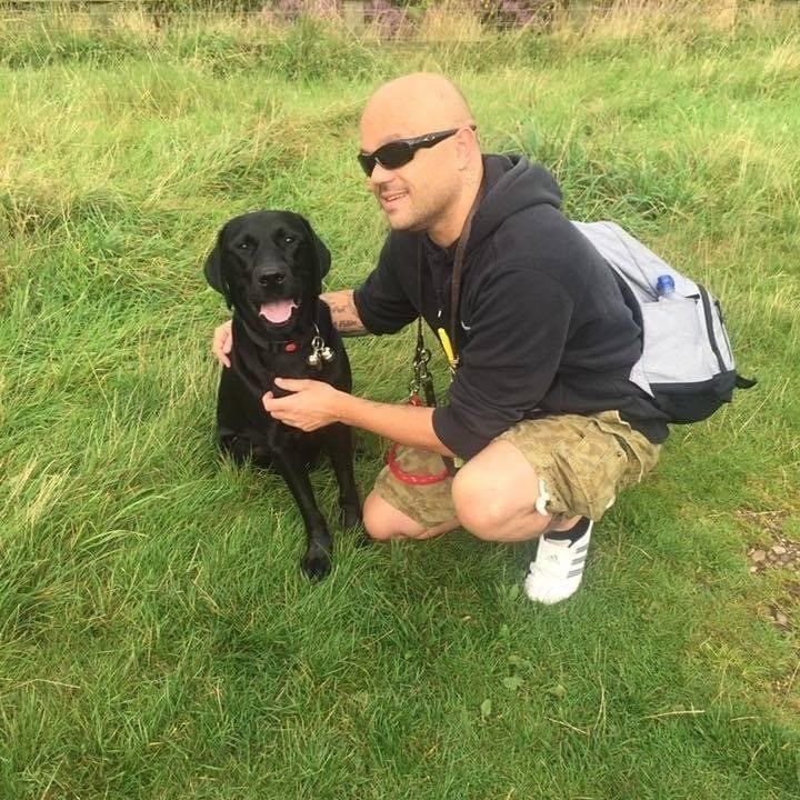 Wayne pugh and guide dog vince up Park hall hills six months after being matched together