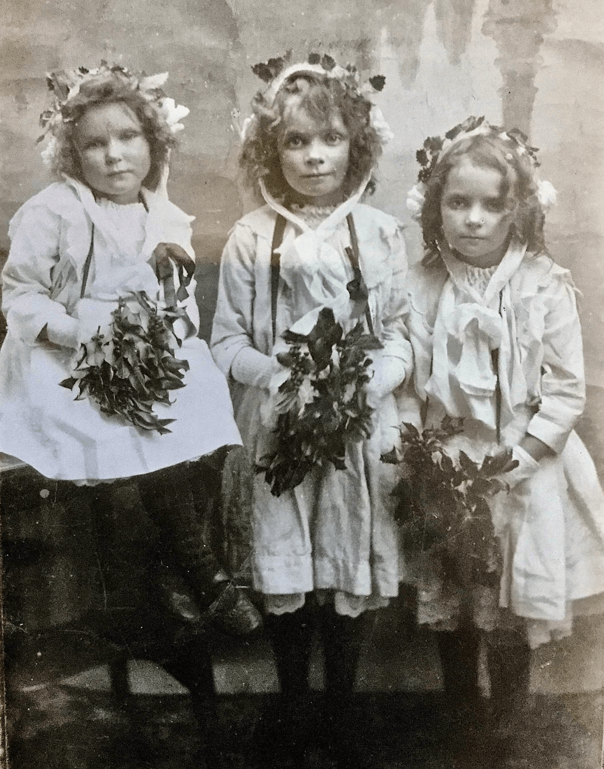 Ivy, Norah, and Dor as three young flower girls