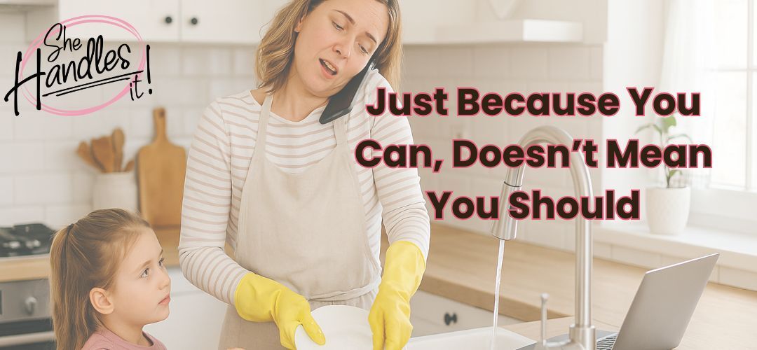 Woman multitasking in a white farmhouse kitchen—washing dishes, talking on the phone, with a laptop 