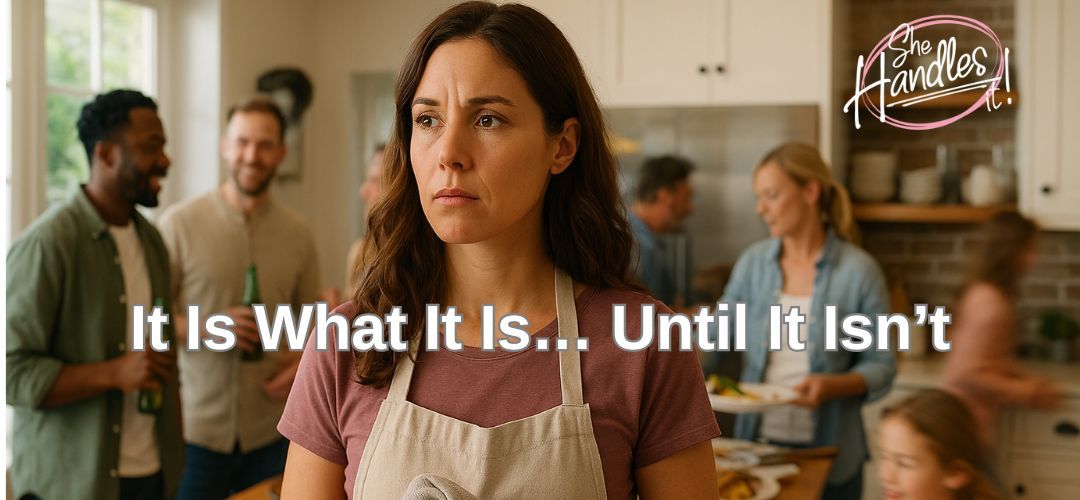 Woman standing still in a busy kitchen while others socialize, symbolizing overwhelm and the moment 