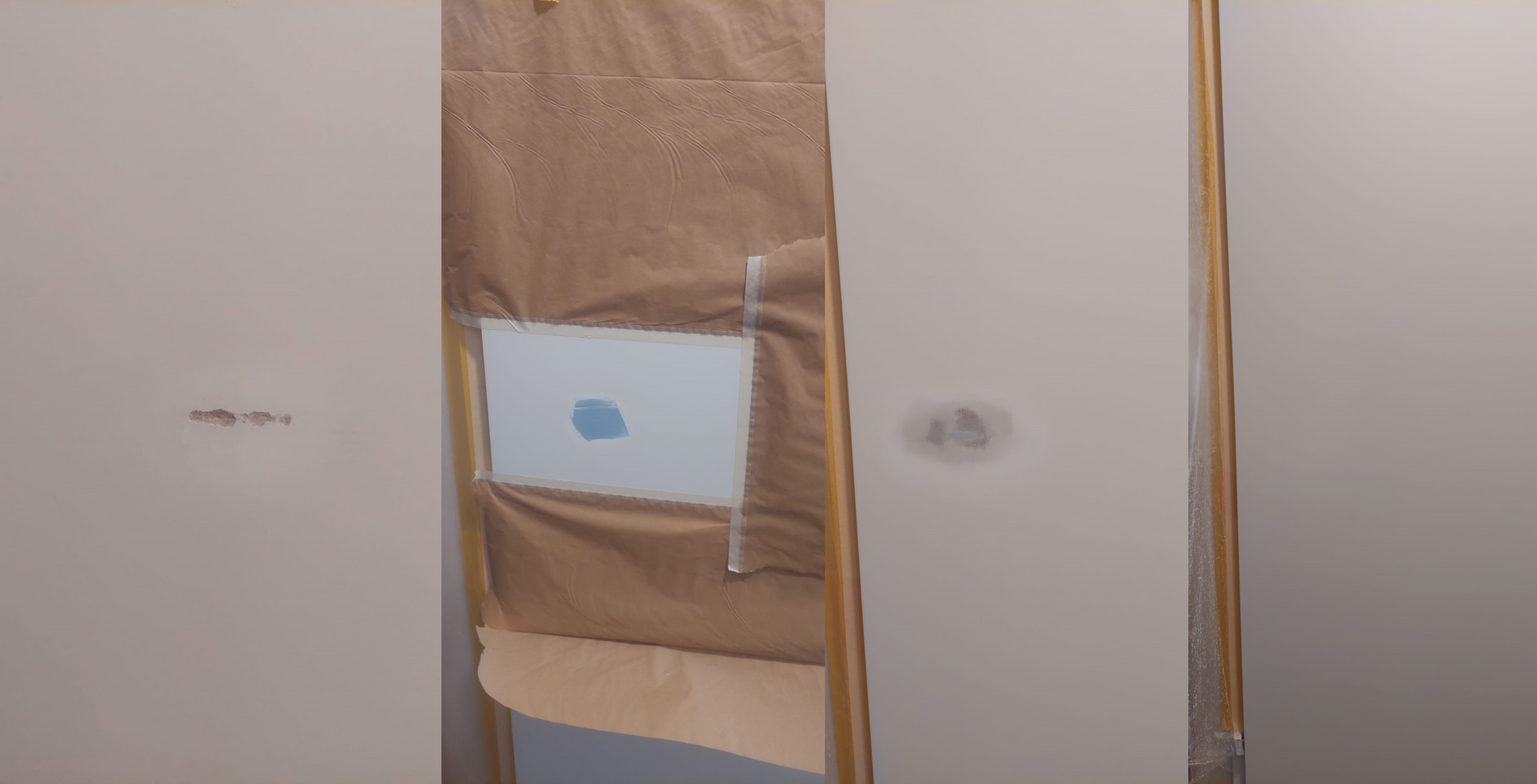 An der Wand neben einer Tür hängt ein Stück Papier.