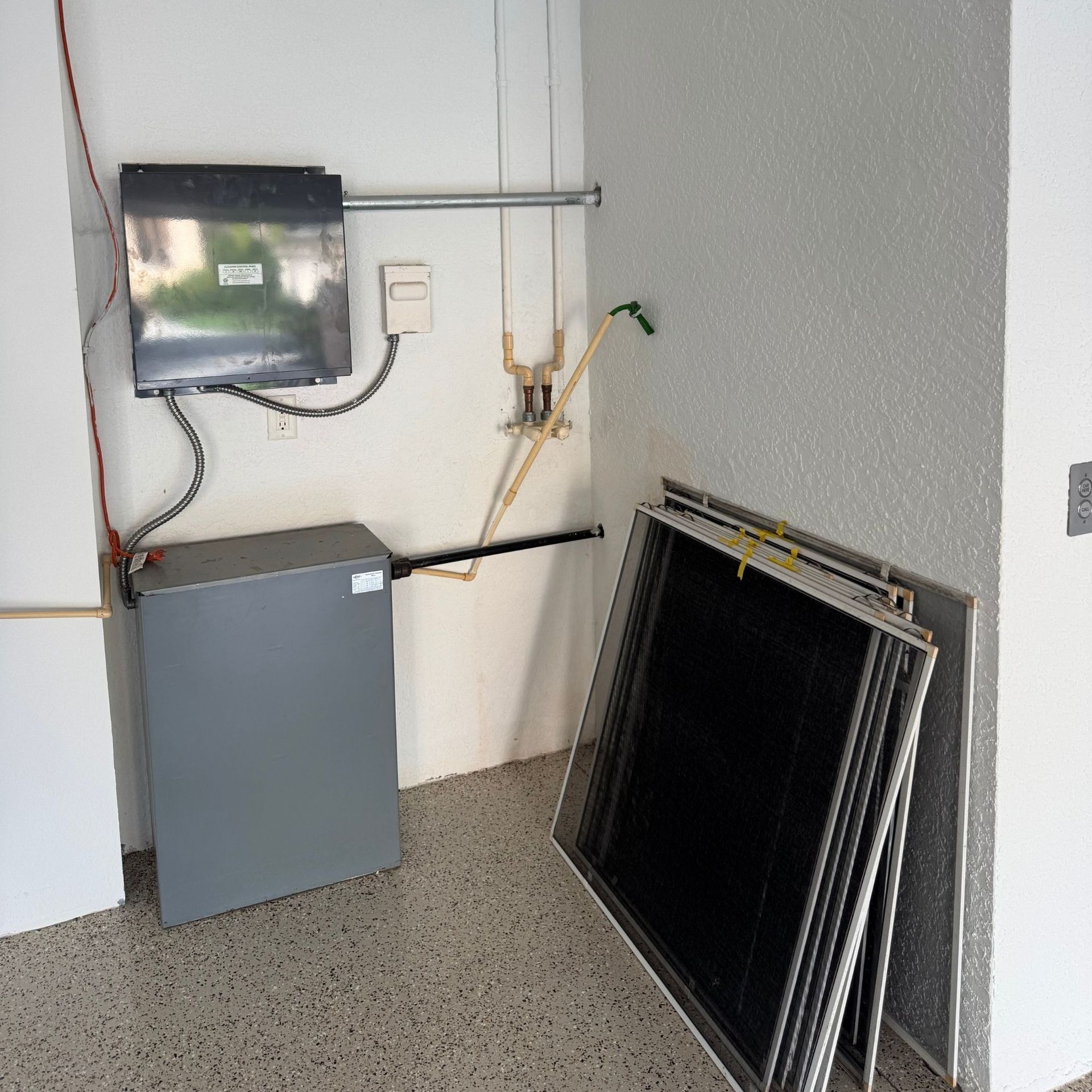 Tarpon Plumbing & Drains - A room with a box that says ' electrical ' on it