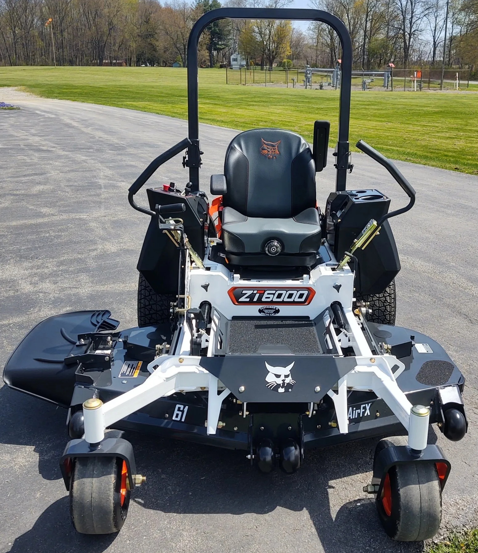 A bobcat zt 6000 lawn mower is parked on the side of the road