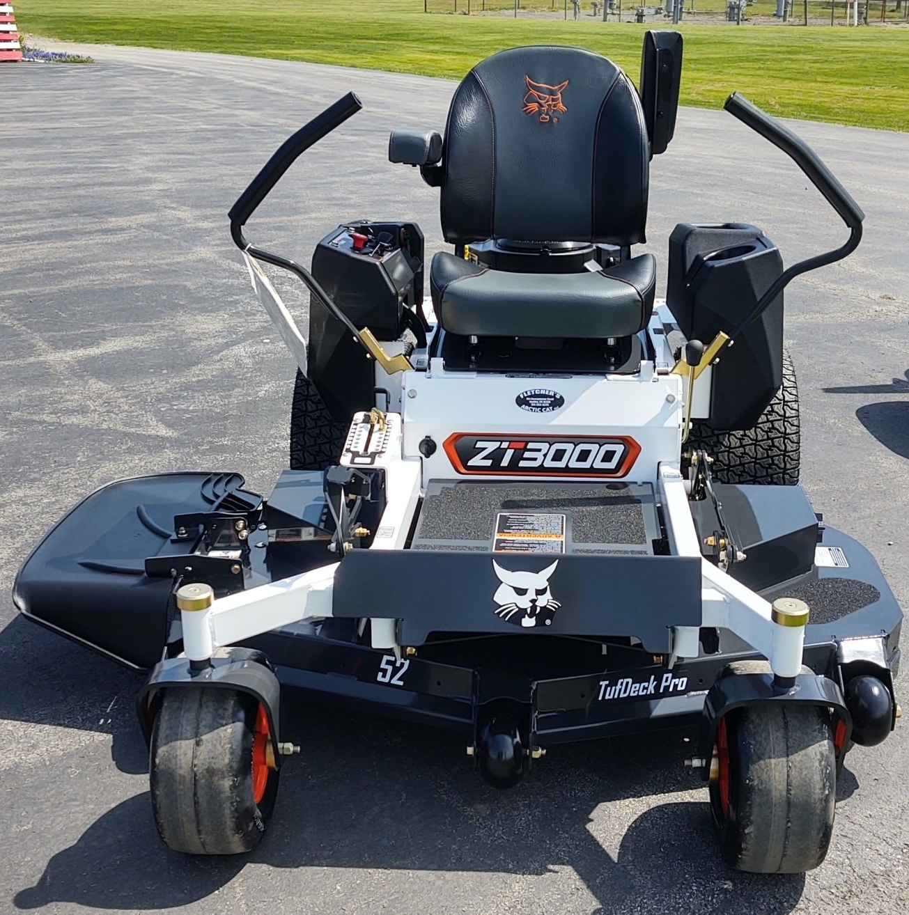 A bobcat zt3000 lawn mower is parked in a parking lot