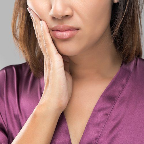 Woman with tooth pain