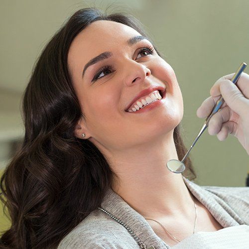 Woman Smiling at the Dentist