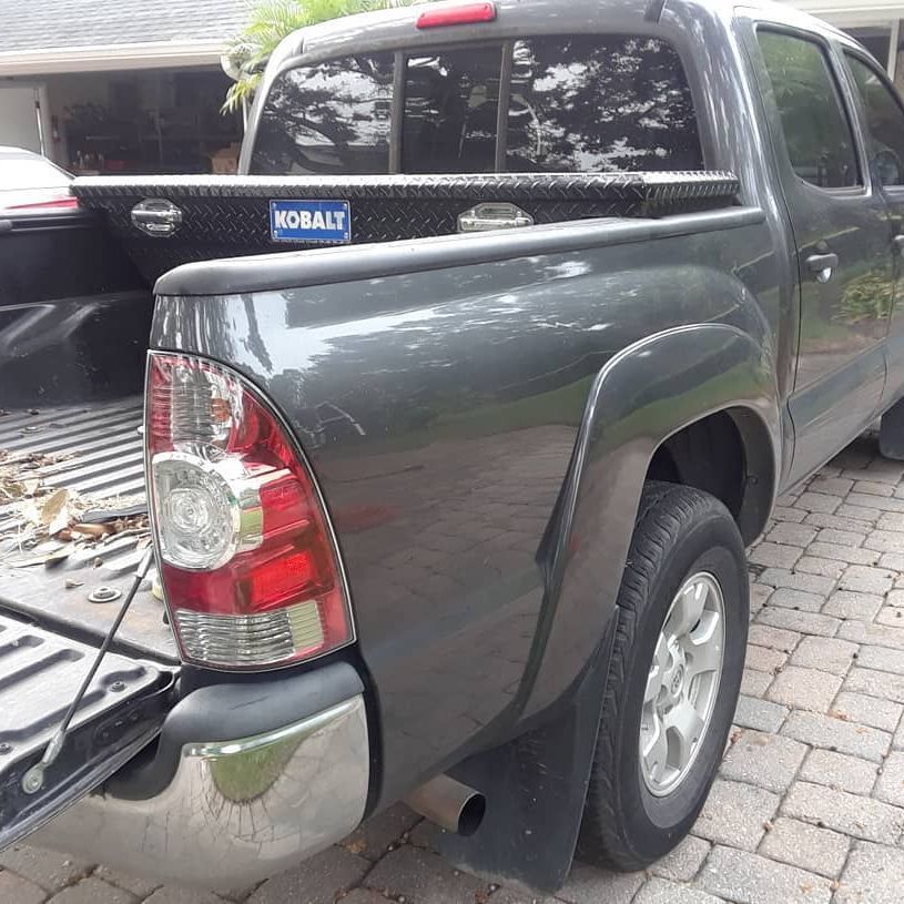 A black truck with a kobalt sticker on the back