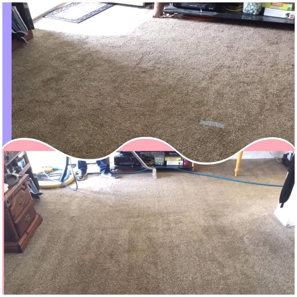 Mechanic assembling engine components in a workshop; black gloves, red overall.