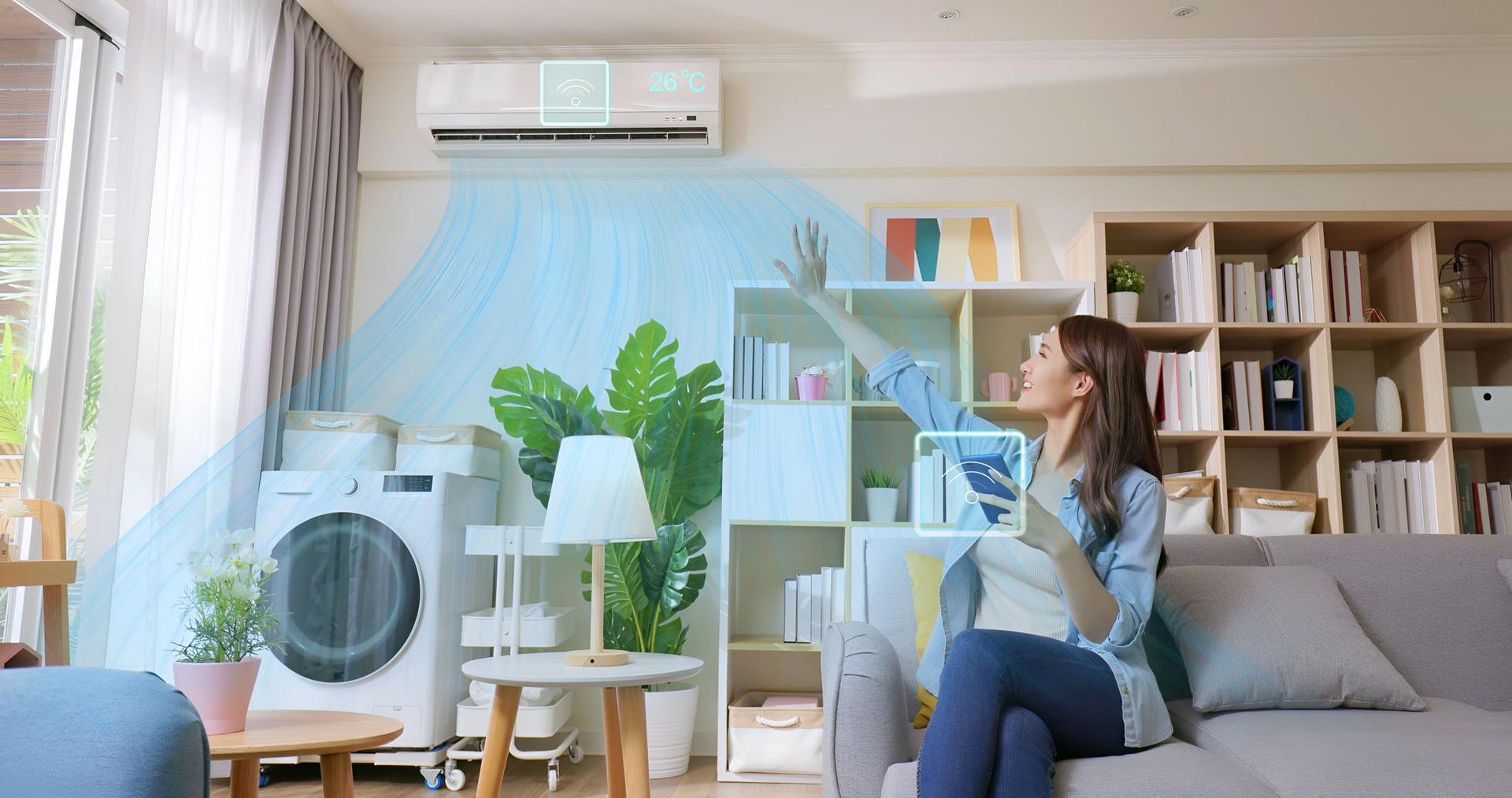 Woman uses tablet to control AC unit in living room; cool air flowing.